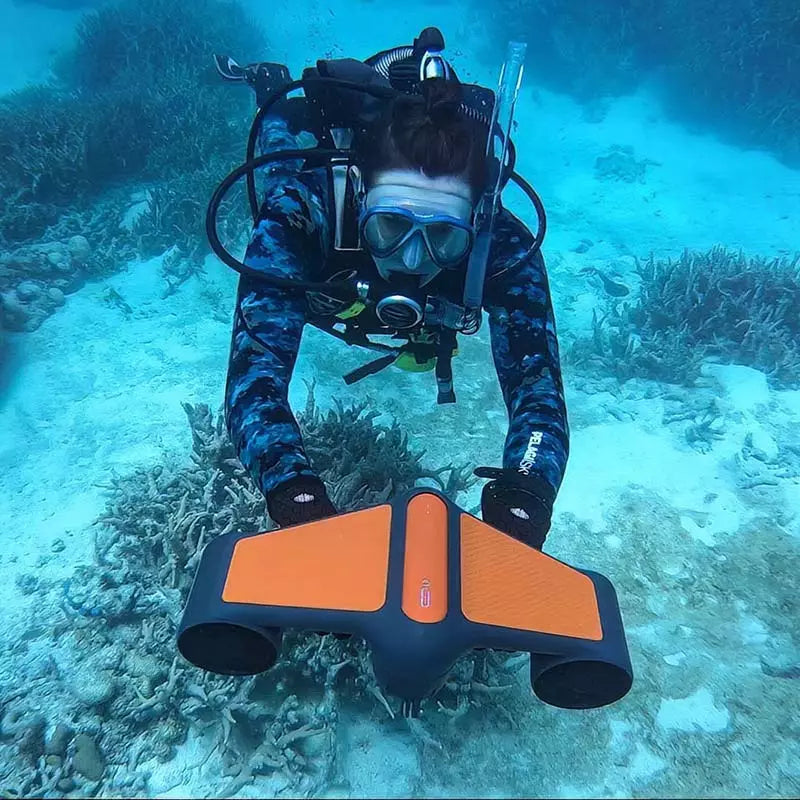 scuba-diver-with-geneinno-s1-pro-scooter-on-coral